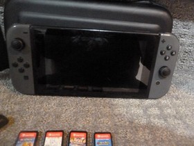 Nintendo Switch Original Console Gaming Bundle with dock games controllers case