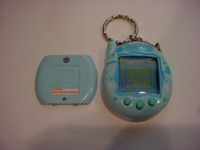 nice,working,original TAMAGOTCHI CONNECTION light blue w/white/blue BUBBLES
