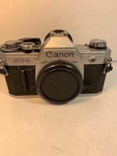 (37)APPAREIL REFLEX SRL CANON AT 1 SEMIAUTOMATIQUE ANNEE 1976