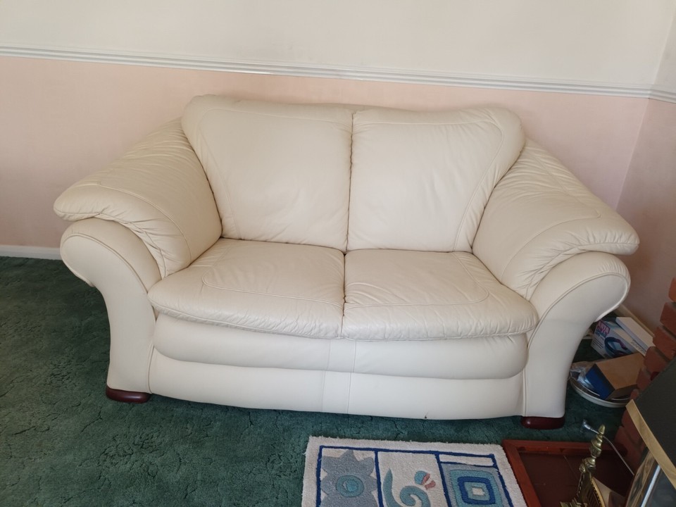 Non reclining 2 x 2 seater watts the furnishers cream leather sofas
