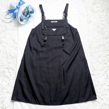 USED PRADA RE-NYLON APRON DRESS WITH TRIANGLE LOGO AND SAFFIANO LEATHER GOOD