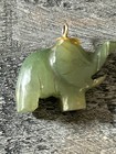 VINTAGE HAND CARVED GREEN JADE ELEPHANT PENDANT — photo 1