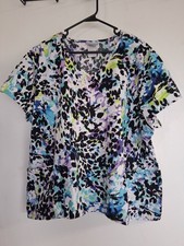 Size 3XL scrub top in multi color print by Scrub Star. 100 cotton. Excellent
