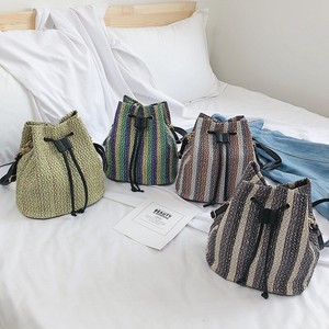 woven straw bucket bag