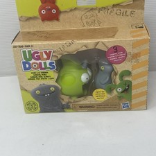 UglyDolls Babo and Squish-and-Go Sharwhal, 2 Toy Figures with Accessories.FS