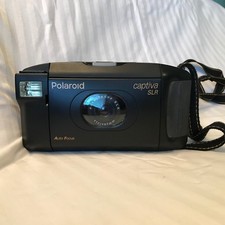 Polaroid Captiva SLR Auto Focus Instant Film Camera f12/107mm Lens  Neck Strap