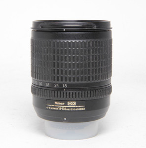 Nikon 18-135mm F/3.5-5.6G ** Excessive dust inside the lens.