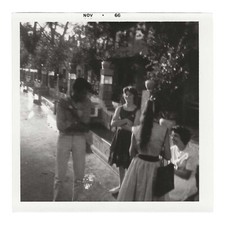 Vintage Snapshot Photo Man Women Long Hair Ponytail Back To Camera 1960s B&W