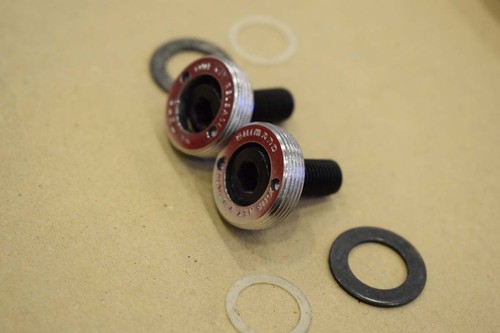 Juego de tapones antipolvo pernos brazo biela Shimano 600 dx plata vintage cromo NOS - Imagen 4 de 5