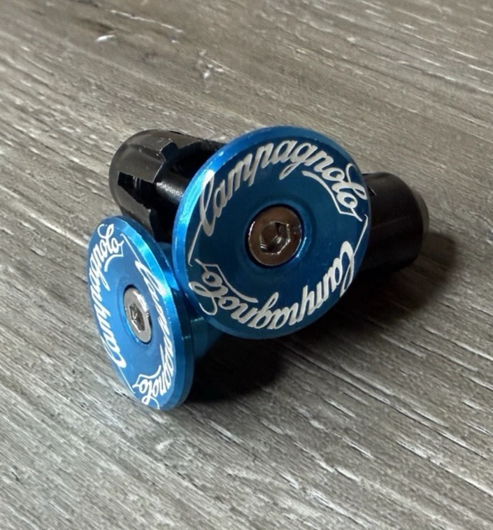 2 BOUCHONS DE CINTRE GUIDON CAMPAGNOLO ANNIVERSAIRE 50 A