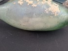 Antique Green Glass Torpedo Bottle With Stuff Inside — photo 5