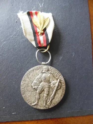 Swiss 1950 war medal(?) in silver (?). I don't know.