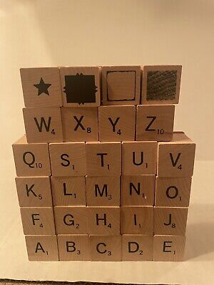 Cardboard letters made by alphabet stamps spelled out on cardboard