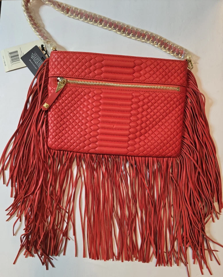 Bolso sin asas Brian Atwood nuevo con etiquetas precio de venta sugerido por el fabricante 198,00 USD - Cuero naranja con flecos Foto 2 de 4