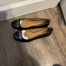 COACH Oswald Black Patent Leather Ballet Flats with Gunmetal Buckle Accent