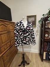womans John Meyer size 12 multicolored long sleeved black floral lined blazer