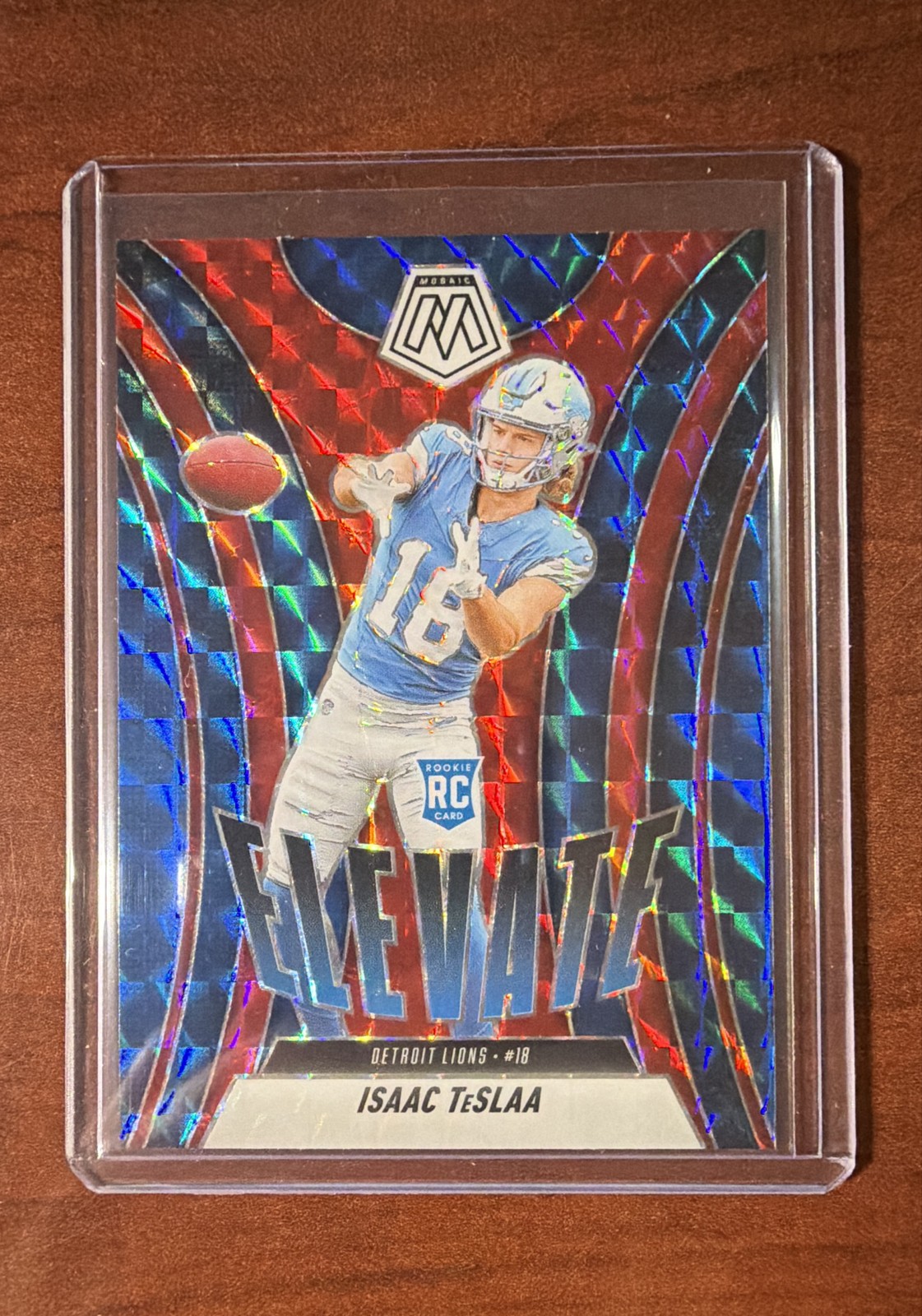 2025 Panini Mosaic - Elevate Isaac Teslaa #8 Red Mosaic Prizm (RC)