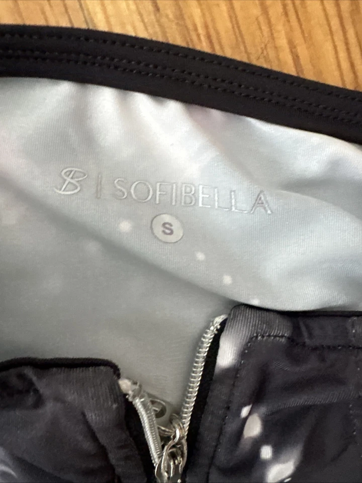 Tenis de golf Sofibella monocromo sin mangas 1/4 cremallera para mujer Foto 3 de 4