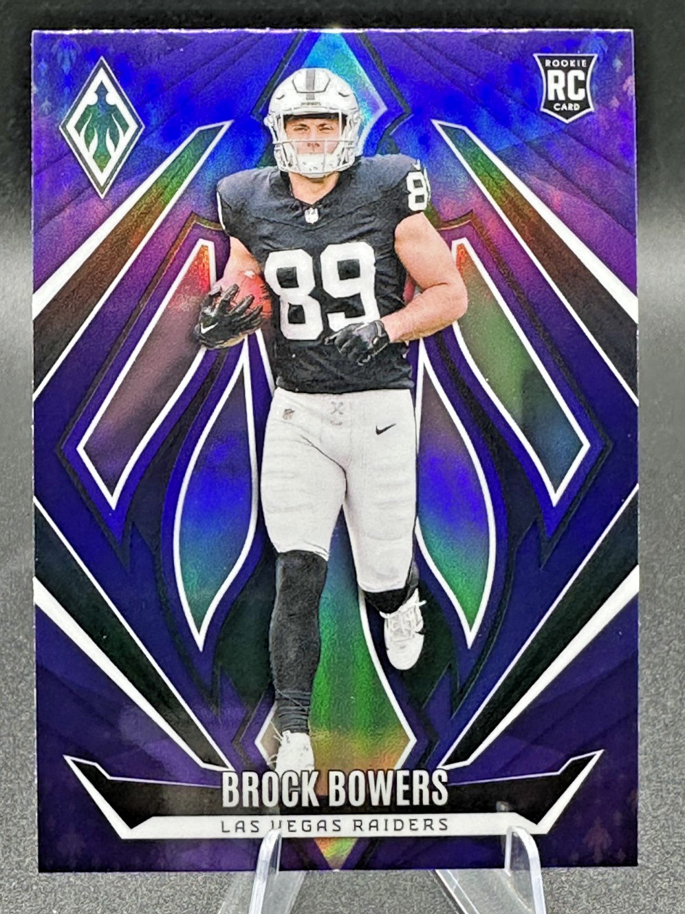 2024 Panini Phoenix - Rookies Brock Bowers #165 Purple (RC) - LA Raiders