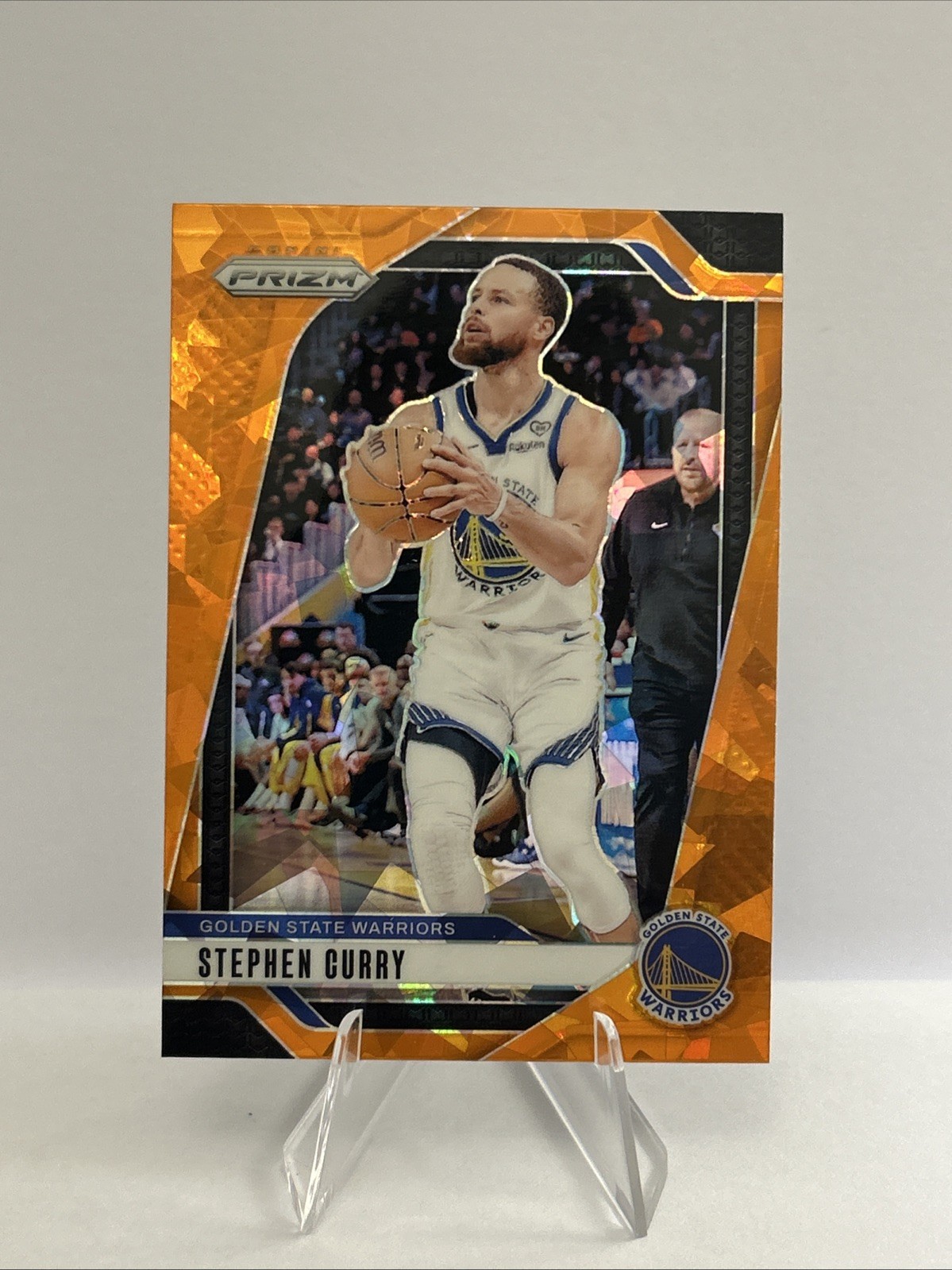 Stephen Curry 2024-2025 NBA Prizm Orange Cracked Ice #134 SP Warriors