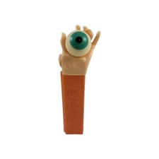 Vintage PEZ Psychedelic Eye Hand Flesh Colored Orange Stem Candy Dispenser
