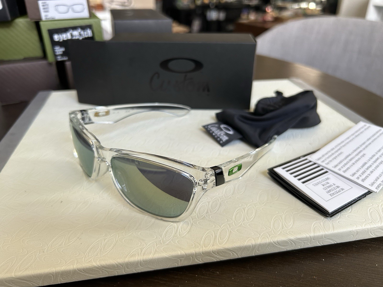 NEW Oakley Custom Jupiter Clear with green logo / Emerald Iridium