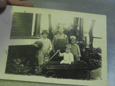 Vintage Real Photo postcard Four Children wih Coaster Express Wagon