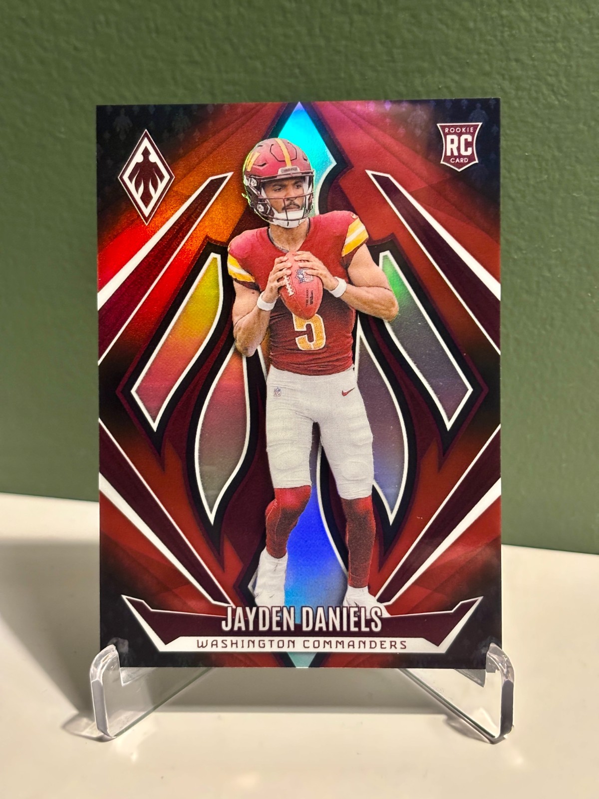 Jayden Daniels - Red Fade /299 - 2024 Panini Phoenix Rookies #198 (RC)