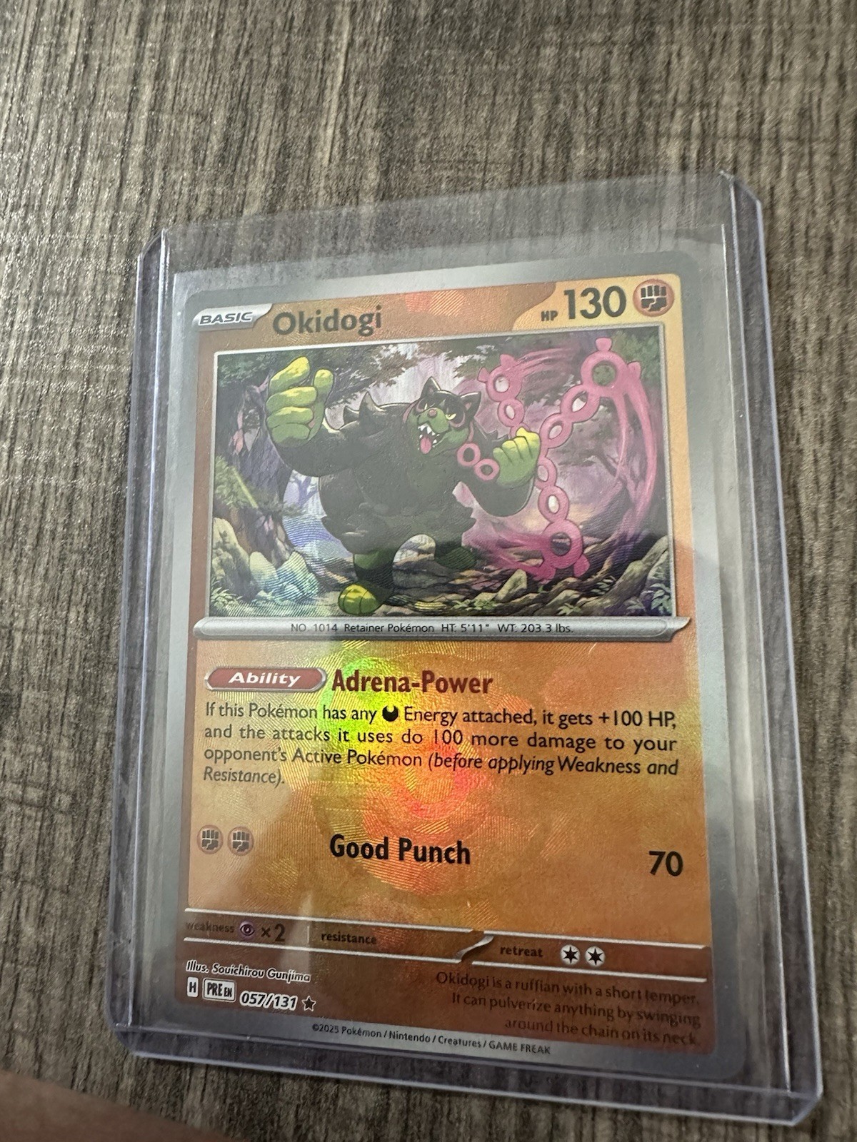 Okidogi (Master Ball Pattern) 057/131 Sv: Prismatic Evolutions Holo NM