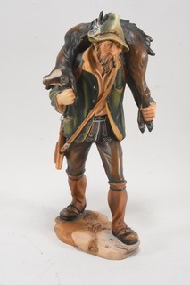 Q65R71 Holzschnitzerei Lepi Jäger mit Bock
