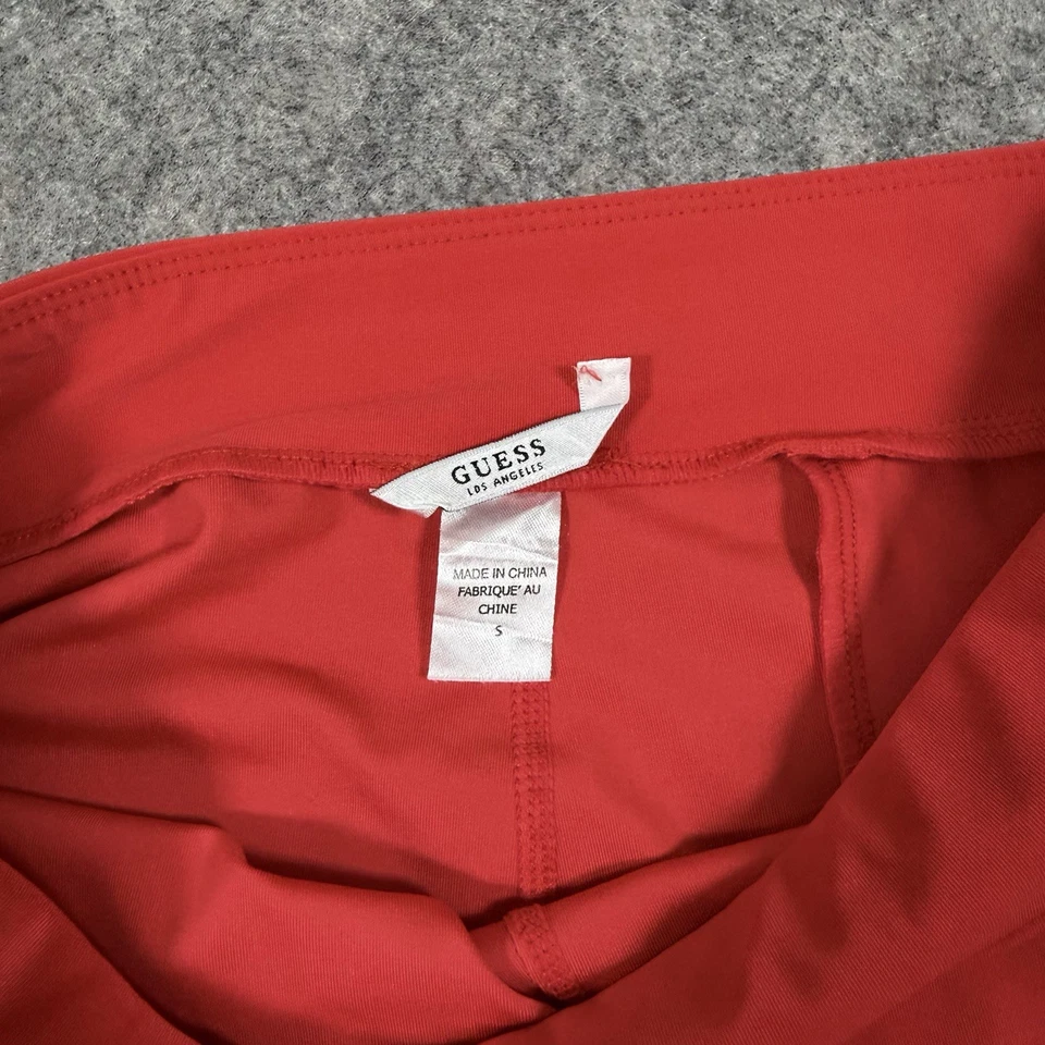 Legging Guess Activewear elástico con logotipo para mujer talla pequeña (se ajusta realmente a W25xL27) rojo Foto 3 de 4