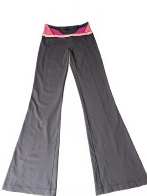 Lululemon schwarze ausgestellte Yogahose mit rosa Bund Größe 6