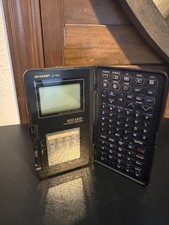 Sharp Wizard OZ-7000 Electronic Organizer Vintage 1989 PDA Nonworking Prop