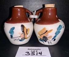 Salt & Pepper Shakers Ma & Pa Hillbilly Whiskey Jugs ALABAMA Souvenir Vintage