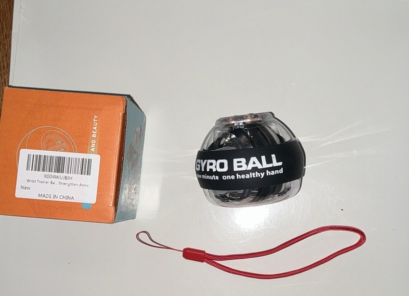 GYRO BALL Powerball Self-Starting Variable Speed Metal Wrist Trainer w/ Strap