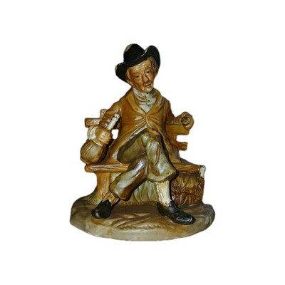 Ceramic Painted Seated Man Figurine on Bench, Brown & Black People Theme