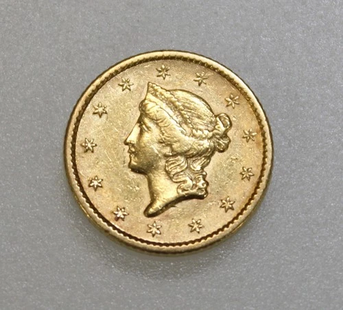 Photo of a 1853-P Gold Dollar from an eBay listing that sold on Jul 15, 2026