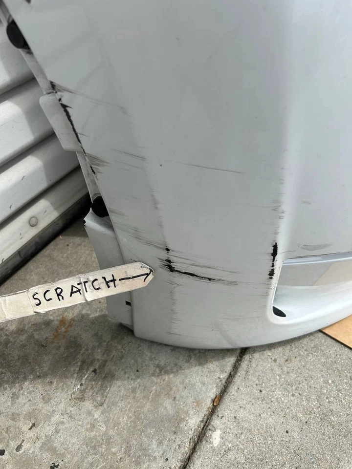 Cubierta de parachoques delantero 22-24 Tesla modelo Y 1687994-TX-A OEM blanca con arañazos Foto 2 de 4