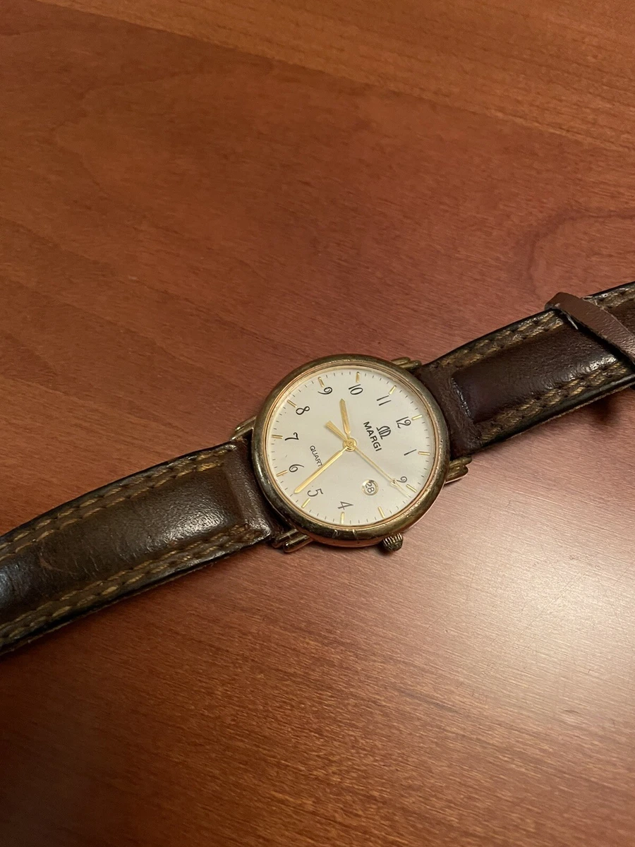 Cerca orologio margi store in oro usato