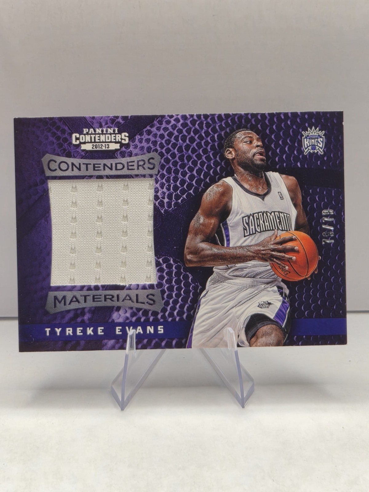 2012-13 Panini Contenders - Contenders Materials Tyreke Evans /79 (MEM) Book-end