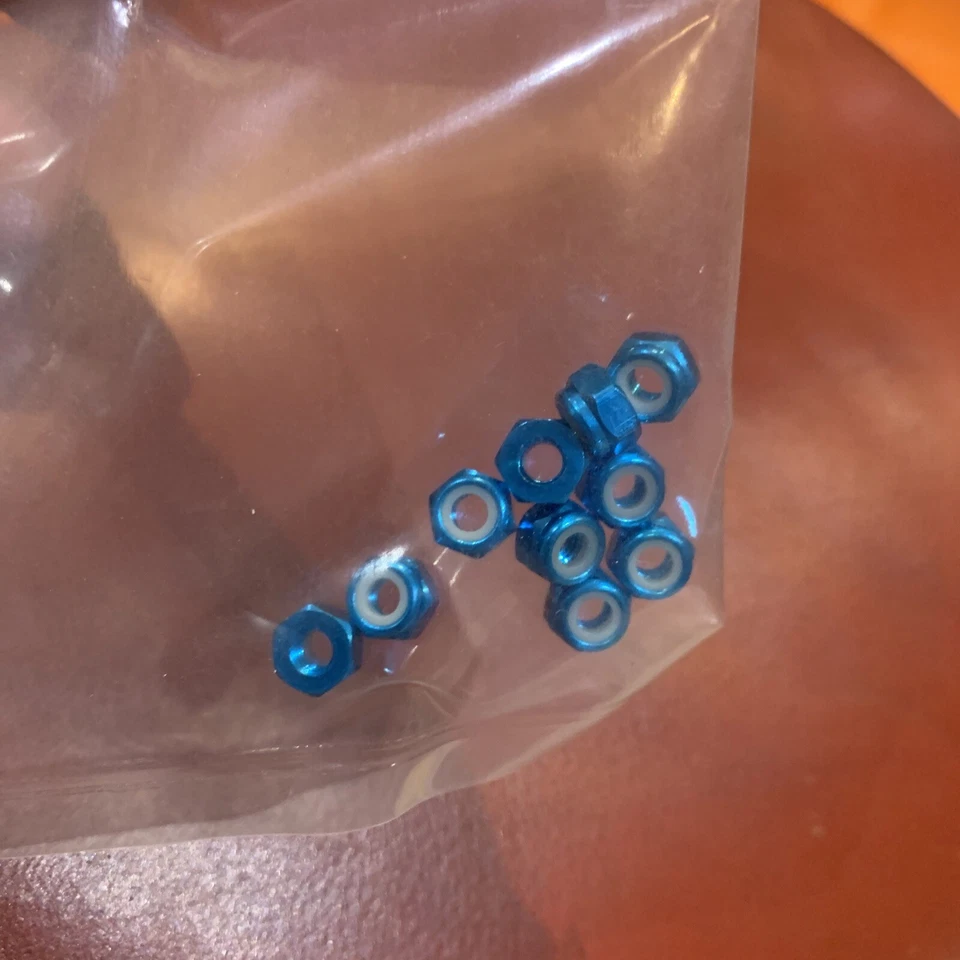 OFNA 10983  Blue nylok nut  4mm 10PCS new - Image 3 of 3