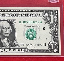 1977  $1 DOLLAR BILL ( ST LOUIS H ) UNCIRCULATED