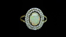 Silver .925 Australian opal ring, 7 x 9 mm oval, SZ 6.25, adjustable to SZ 7