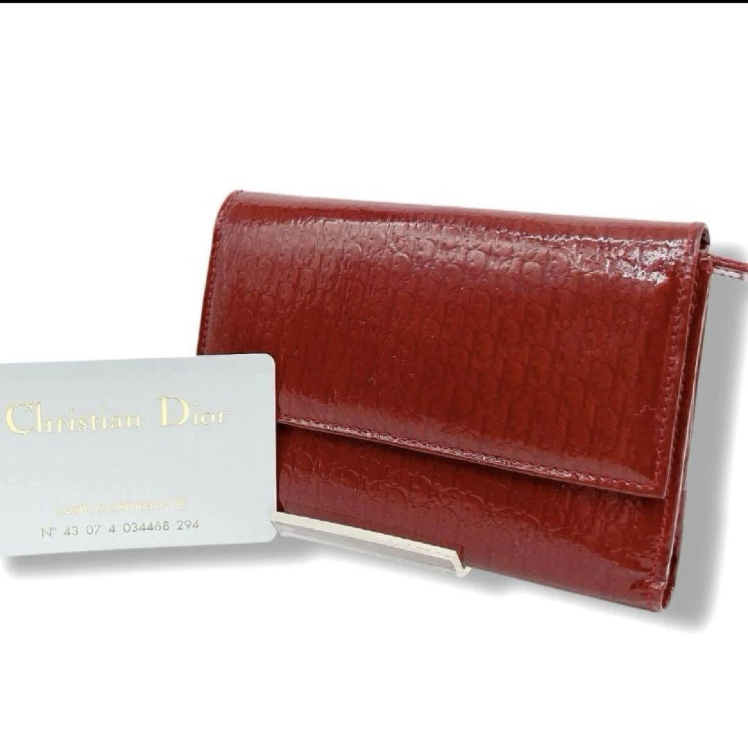 Portefeuille Dior Tri Fold rouge motif intégral capacité 15 cartes