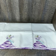 Two Embroidered White Pillow Cases