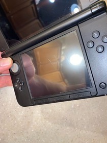 Nintendo 3DS XL Handheld System Red w/4 Games and Charger