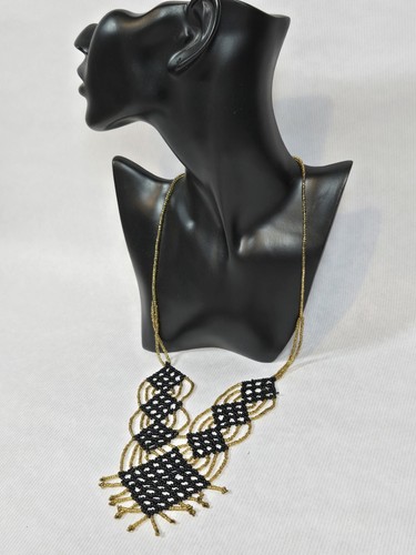 Black and gold plastic beaded statement necklace