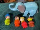 Lot of 3 vintage fisher price clowns and an eleplant and Sherlock hemlock sesame