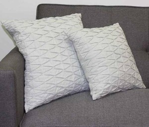 grey textured pillows
