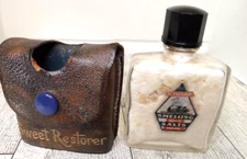 vintage sweet restorer smelling salts made in england with case 2 3/4 tall